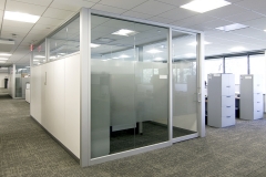 Office front momentum partitions gravity lock systems glass demountable walls.