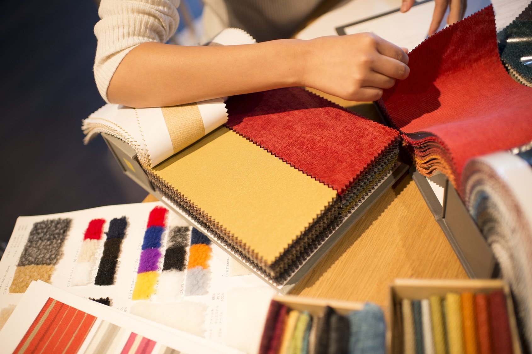 interior designer with fabric and color samples